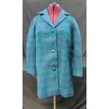 Vintage green and blue ground geometric pattern Welsh tapestry short coat by Mari Lwyd. (B.P.