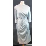 1940's pale blue high neck 3/4 length sleeve dress with star decoration and circle detail on the