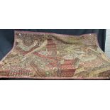 A vintage Indian patchwork Kantha throw bedspread or quilt made from Rajistani wedding saris,