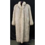 Long blue fox fur coat by Saga Fox. (B.P. 24% incl.