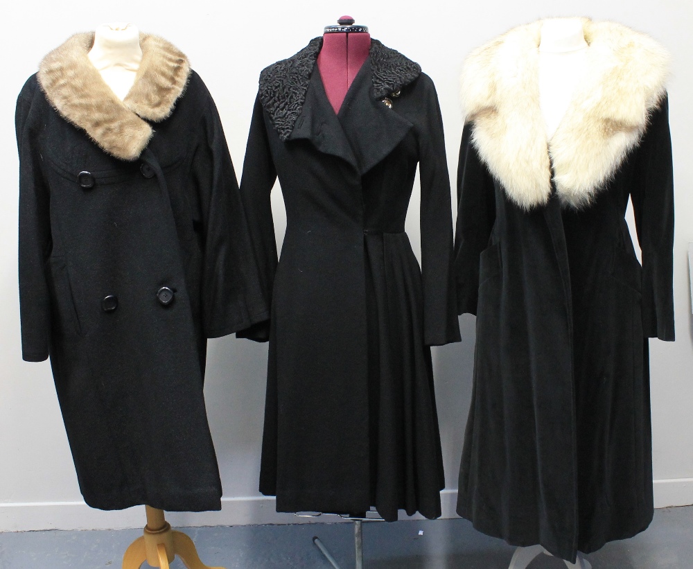 Vintage coats (30's-60's) to include: a black wool crepe coat with astrakhan collar and glass