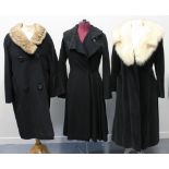 Vintage coats (30's-60's) to include: a black wool crepe coat with astrakhan collar and glass