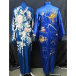 Two vintage kimonos, one embroidered on a blue ground with gold dragons, pagodas etc,