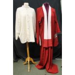 Vintage long burgandy Japanese kimono with a flower embroidered on each sleeve and a Chinese cream