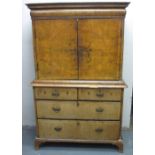 18TH CENTURY WALNUT CABINET UPON CHEST, having moulded cornice over blind cushion frieze drawer,