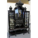 EDWARDIAN EBONISED MAHOGANY DISPLAY CABINET, the central arched,
