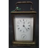 19TH CENTURY FRENCH BRASS CARRIAGE CLOCK having full depth Roman enamel face with alarm indicator,