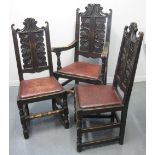 SET OF TEN EARLY 20TH CENTURY STAINED OAK DINING CHAIRS with leather drop-in seats.