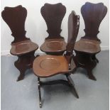 SET OF FOUR 18TH CENTURY MAHOGANY HALL CHAIRS with waisted moulded backs on solid seats,