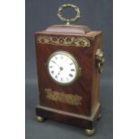 REGENCY MAHOGANY MANTEL CLOCK with inlaid brass foliate decoration,