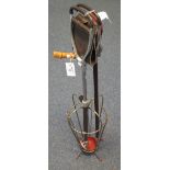 1970's wirework umbrella stand, together with two shooting sticks. (B.P. 24% incl.