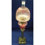 Brass Corinthian column double burner oil lamp with cranberry glass reservoir and etched glass