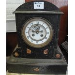 19th Century black slate and marble architectural two train marble clock with Roman white enamel