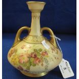 Royal Worcester porcelain blush ivory baluster shaped two handled vase,