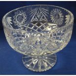 Large heavy cut lead crystal pedestal fruit bowl with star and flower head decoration.