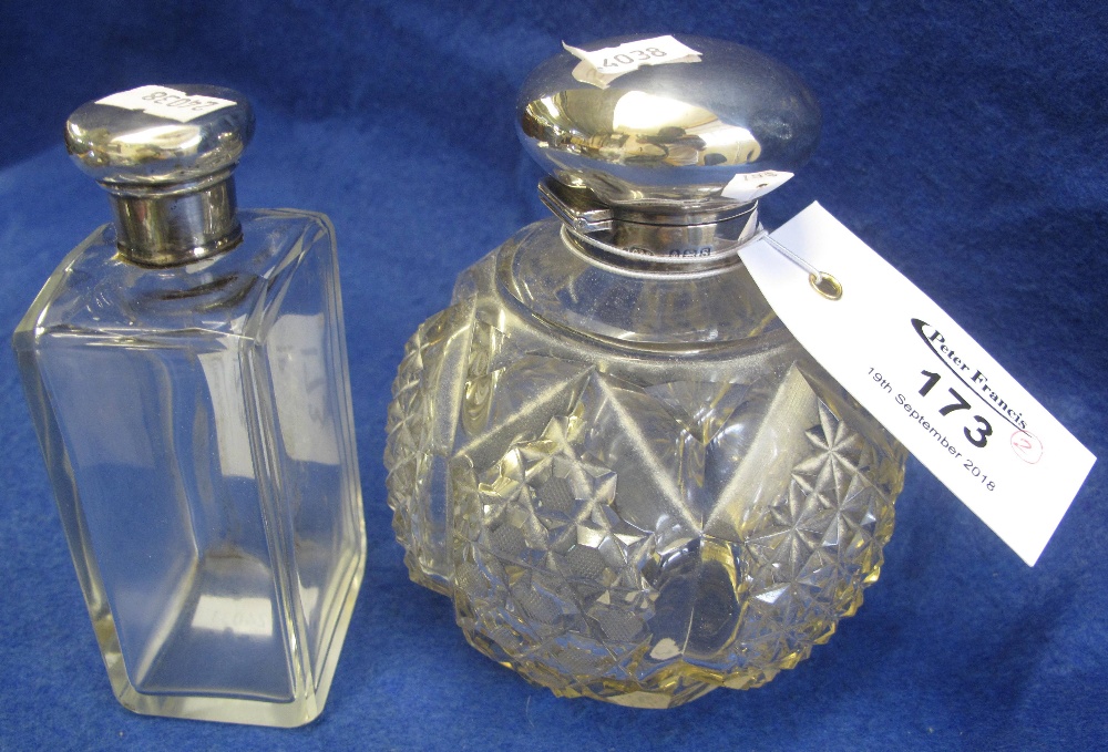 A silver topped hobnail cut scent bottle and a plain glass silver topped scent bottle. (B.P.