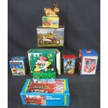 Group of vintage tinplate novelty toys,