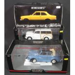 Three Minichamps 1:18 scale diecast mode