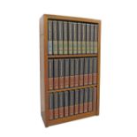 A three shelf bookcase containing 31 volumes of Encyclopaedia Britannica, 15th Edition, leather