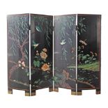 A Chinese four fold screen, black lacquer ground, carved decorations on both sides, flowers and