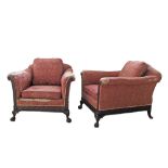 An English Chippendale style pair of carved mahogany frame sofa armchairs in red floral