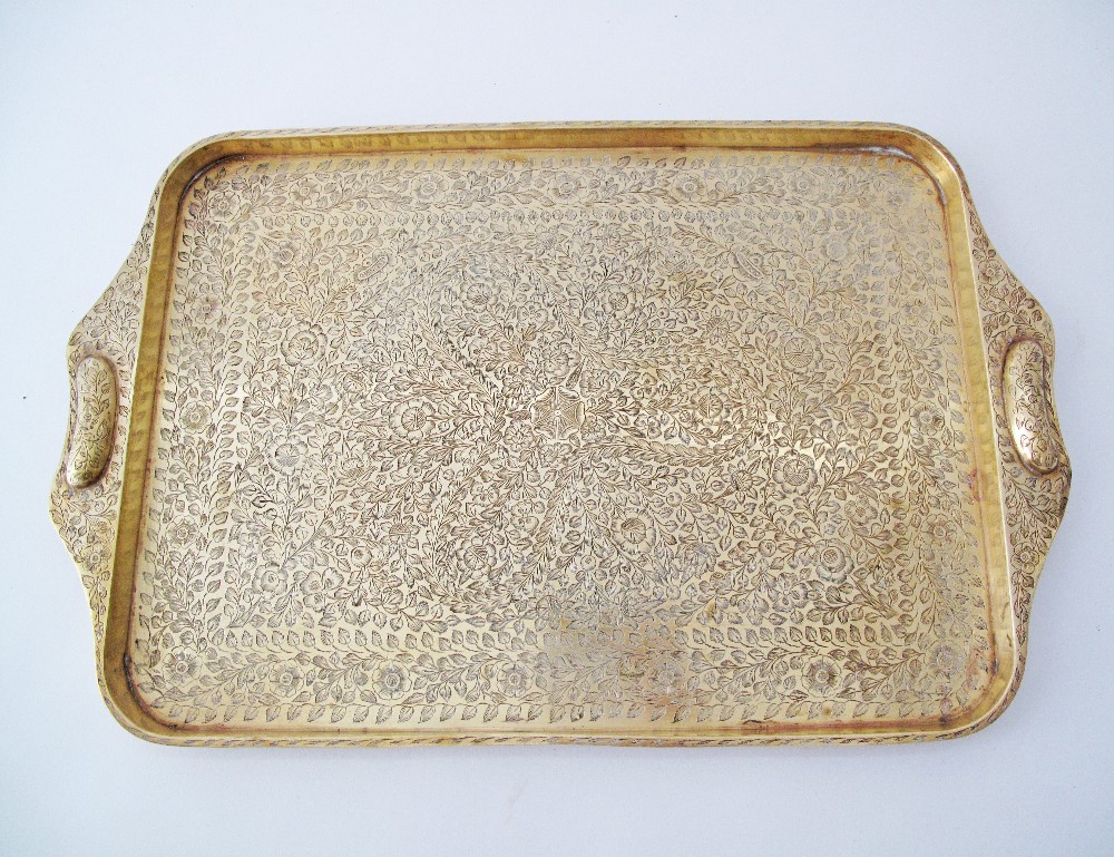 An engraved brass oblong tray, Indian mid 20th century, 32X51cm.