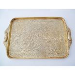 An engraved brass oblong tray, Indian mid 20th century, 32X51cm.