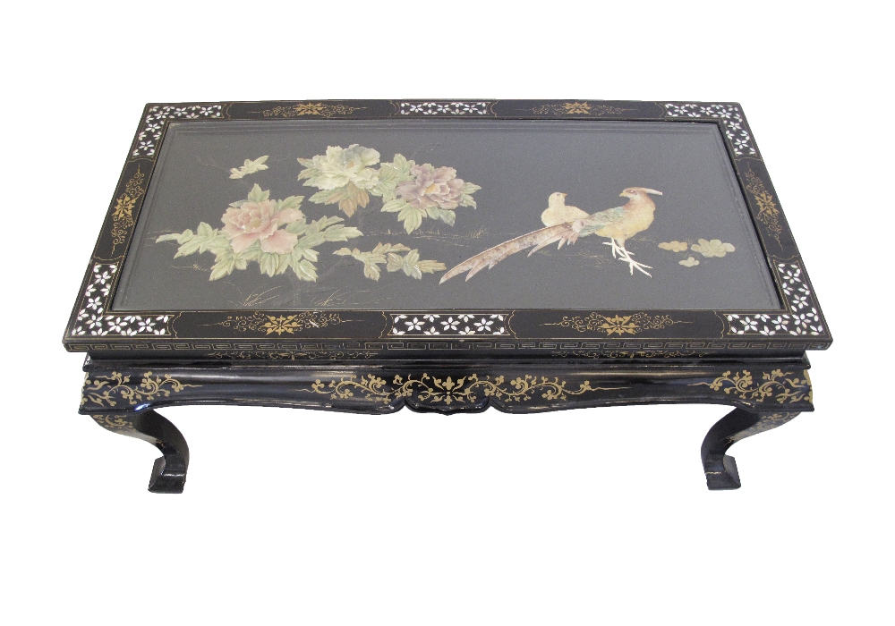 A Chinese black lacquer, painted and mother of pearl inlaid coffee table with collapsible legs. - Image 2 of 7