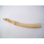 An African carved ivory pipe L48cm, weight: 495g.