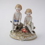 A Fine and rare German Goebel porcelain figure of two children c1950s H8cm.