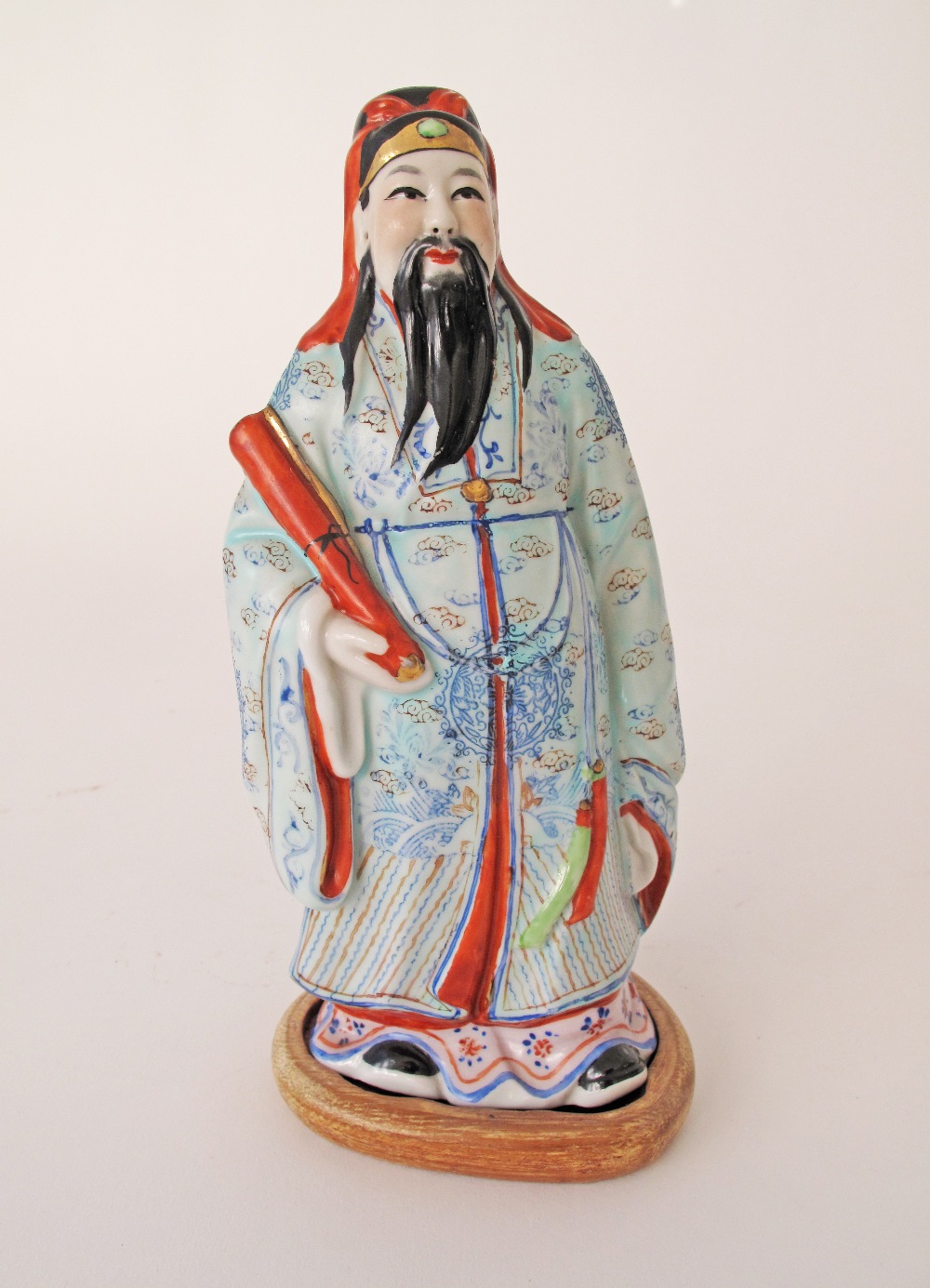 Three Chinese handpainted porcelain figures of holy men on wooden bases. Early 20th century. - Image 7 of 11