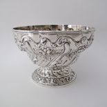 A Sterling silver rose bowl, with repousse and engraved decorations of flowers, London - Dobson