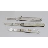 A collection of three silver pocket knives. One knife marked T T & Co, Sheffield 1945, L12cm, one