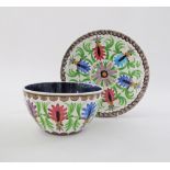 A set of two Greek Keramikos ceramic dishes, a charger W29cm and a bowl hand decorated with