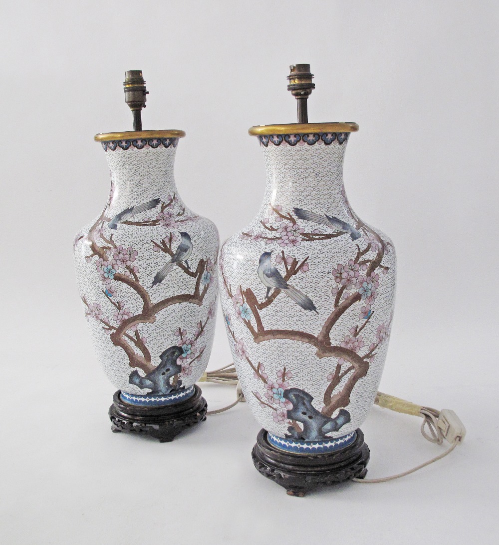 A pair of Chinese cloisonne vases converted to table lamps, decorated with butterflies and flowers