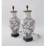 A pair of Chinese cloisonne vases converted to table lamps, decorated with butterflies and flowers