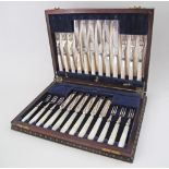 A Victorian DIXONS of Sheffield, silver plated flatware set with engraved ferules and mother of