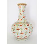 A Large Chinese porcelain ovoid shaped bottle vase with a long wasted neck and a short foot,