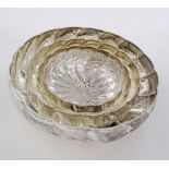 A set of four silver plated fluted shallow bowls, the largest W33cm. (4)