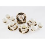 An English Plant Tuscan China set of eight eggshell porcelain coffee cups and saucers decorated with