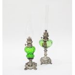 Two green glass and pewter antique Kosmos Brenner oil lamps. (2)