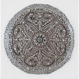 A silver filigree woman's head ornament "tepelik" made in 2 separate disks. The top one decorated