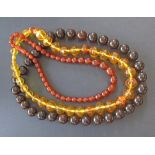 A collection of three Russian amber necklaces in various shades. L56cm, L52cm, L45cm (3)