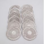 A set of twelve Christofle silver plated coasters c1980s.(12)