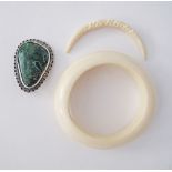 An African elephant ivory carved bangle W90mm together with an ivory carved crescent and a malachite