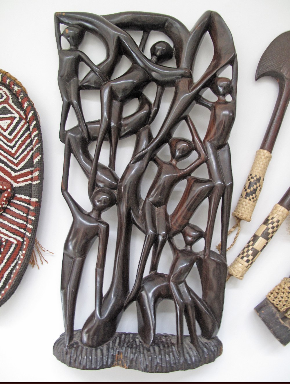 A collection of African artifacts comprising a hardwood carving H42cm, W22cm. (5) - Image 2 of 2