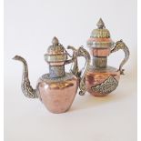 Two Tibetan - Chinese copper and silver Wine Jugs / tea pots, profusely decorated with carved and