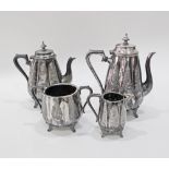 A c19th century probably French silver plated tea set comprising a tea pot, a coffee pot H26cm,