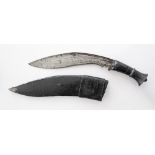 A Gurkha Military Kukri from Nepal contained in its black leather scabbard. L43cm long overall.