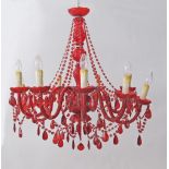 A red chandelier by KARE Munich, Germany 9 light, in metal chrome-plated, acrylic and glass.